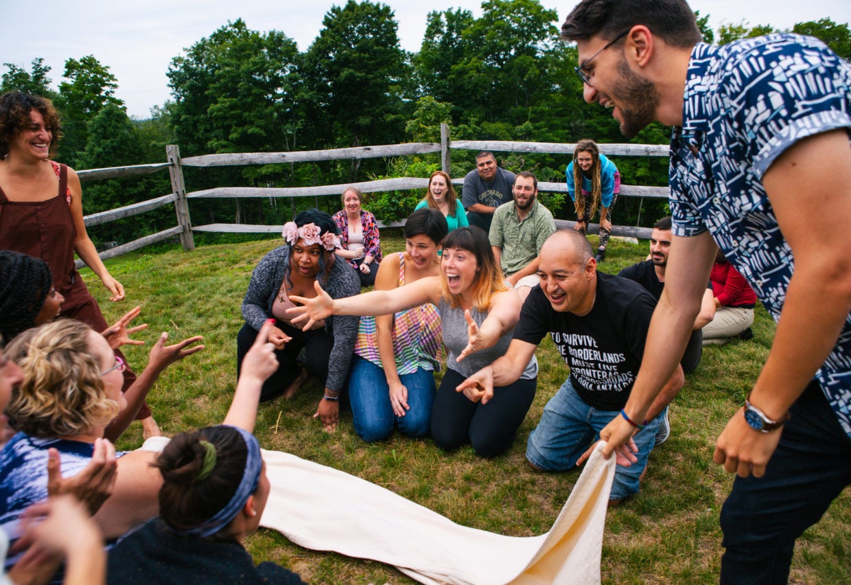 Group of people interacting with an instructor